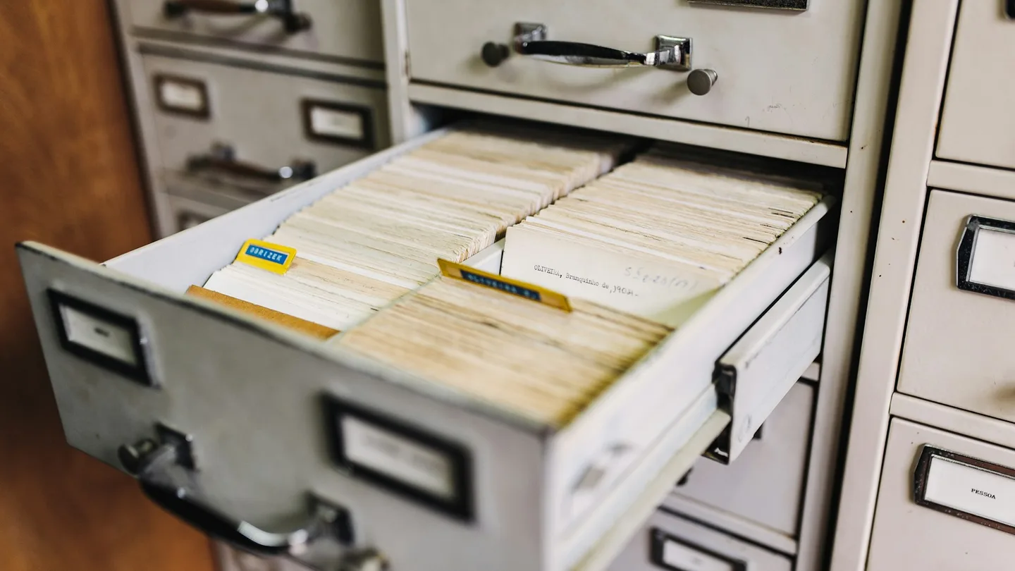 Open drawers of an archival card catalogue