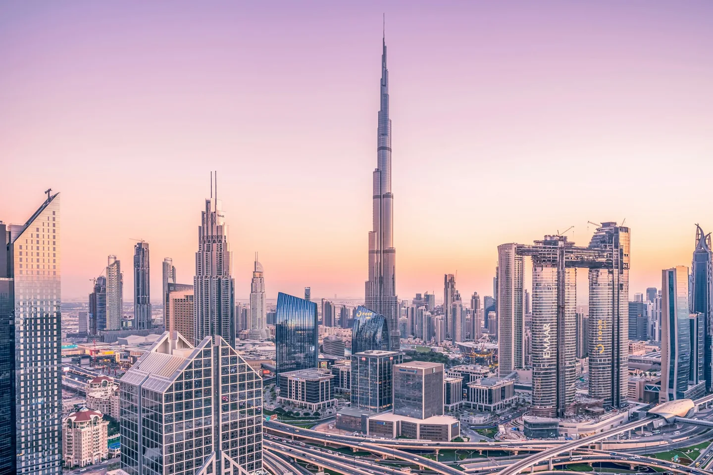 The Dubai skyline and Burj Khalifa at blue hour.