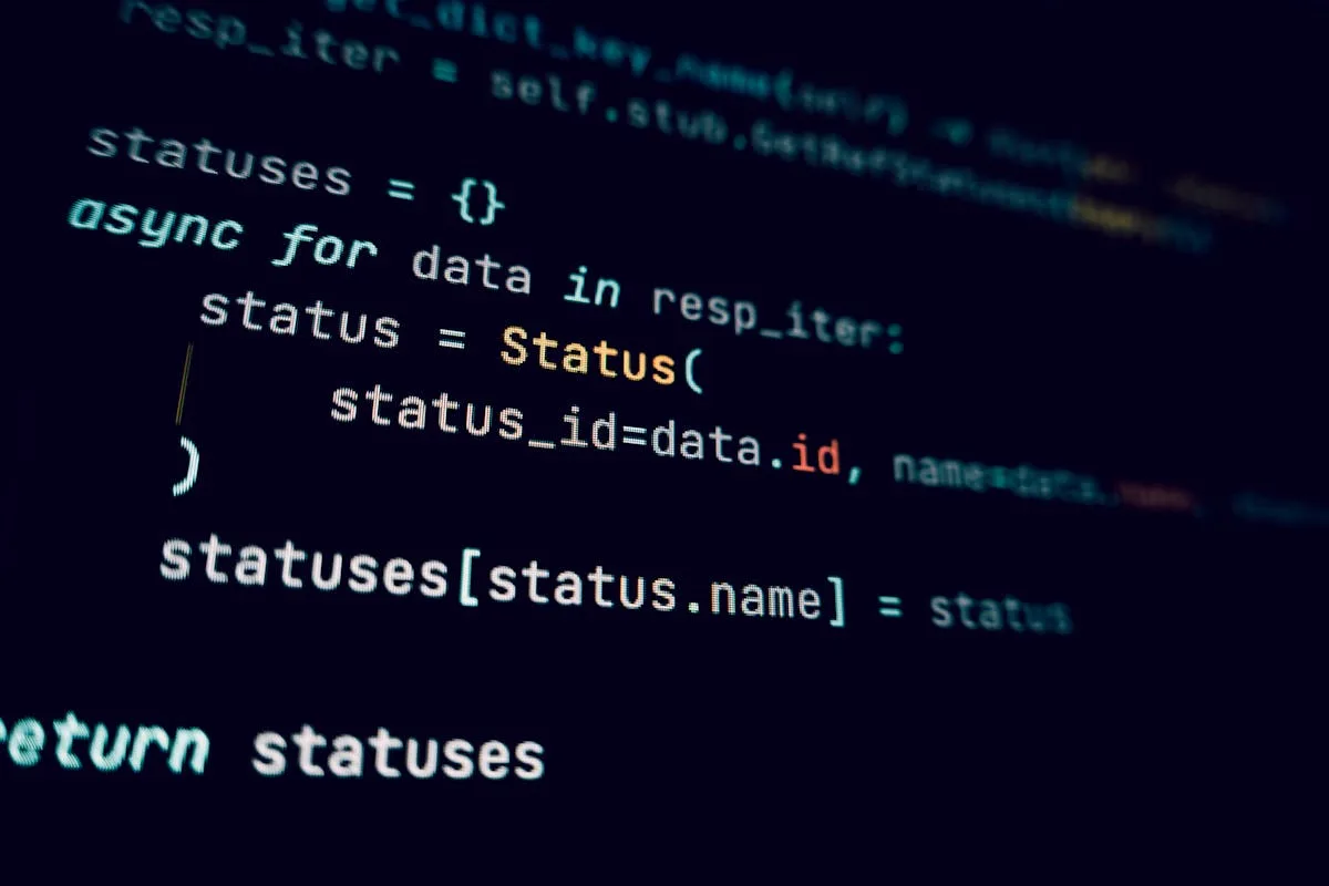 Code on dark screen representing the git-backed markdown vault architecture