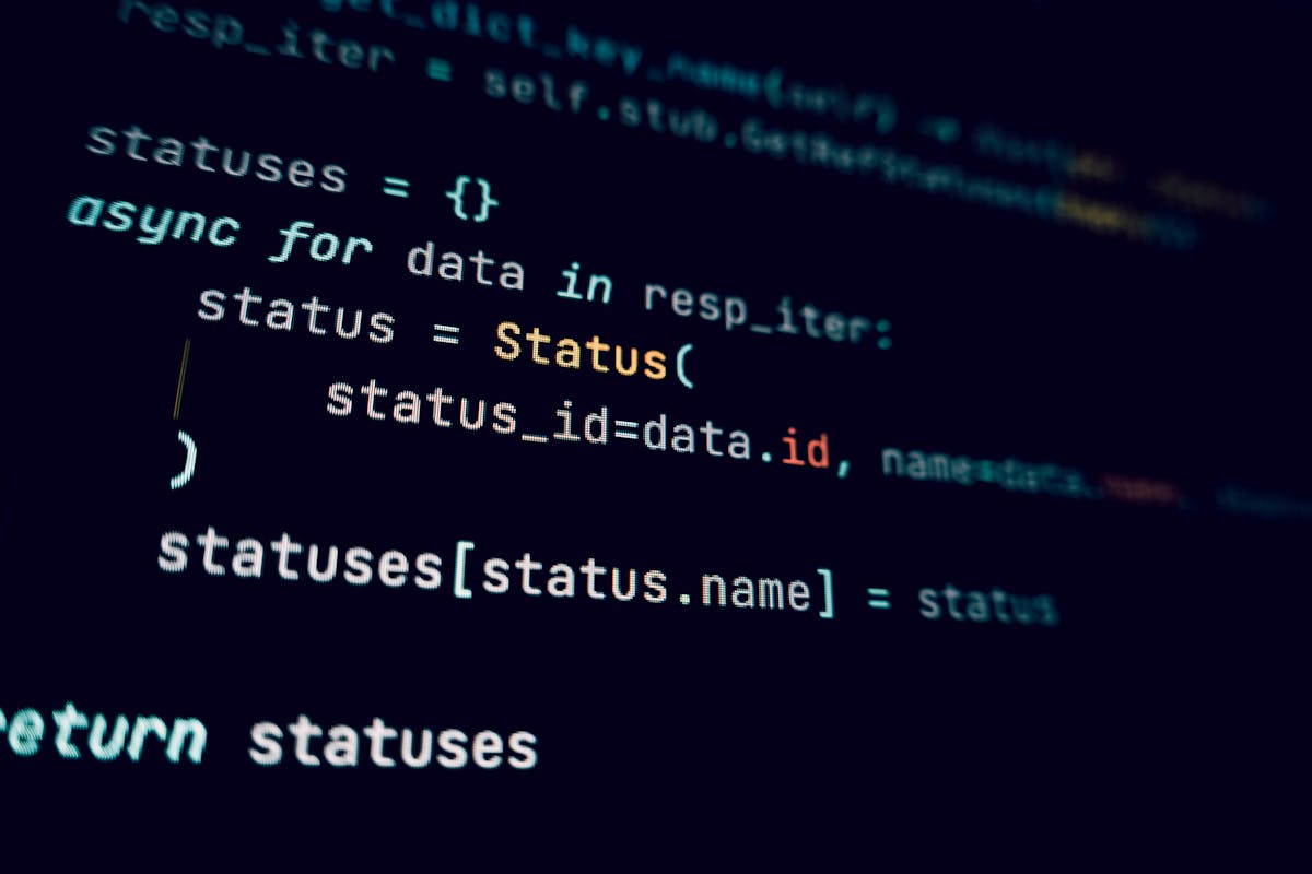 Code on dark screen representing the git-backed markdown vault architecture